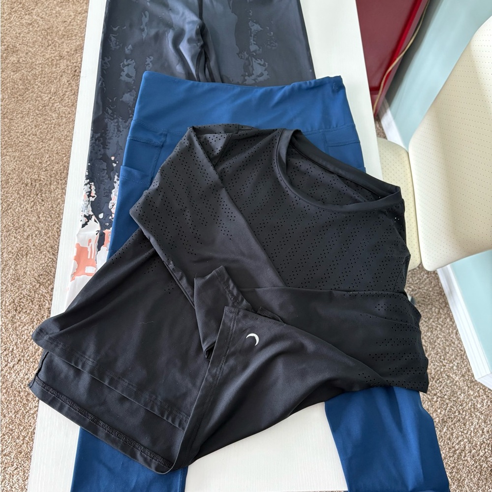 Zyia Active Trio: Black Perforated Top, Blue Pocketed & Black Patterned Leggings